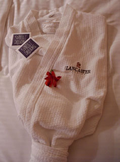 Turndown service, with chocolate and robe ready at the Lancaster Hotel