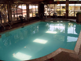 Indoor heated pool and spa at the Jellystone Hill Country Park
