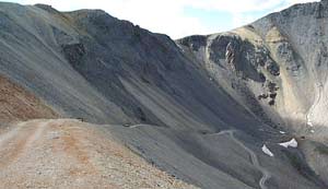 Note the snow along the road in August. A few weeks before was some prime skiing here.