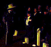 Confederate soldier telling his life story near his gravesite