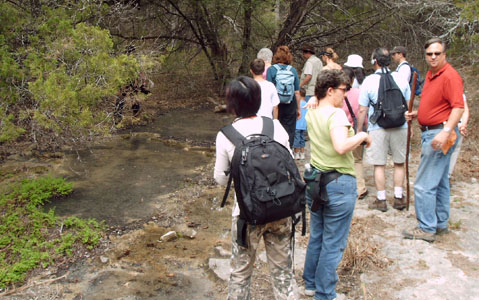 Hikers exploring Long Canyon in Austin