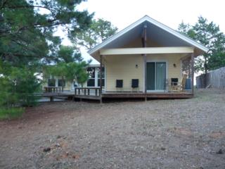 Outside view of Daisy Cottage looking uphill from the pasture area