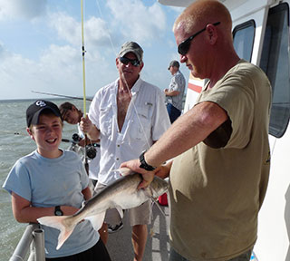 Shane grinning after catching his gafftop.