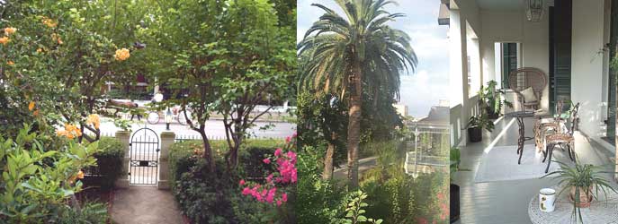 Veranda and grounds of Grace Manor B&B in Galveston