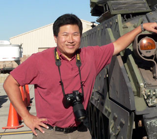 Bernard Zee, pictured with his trusty DSLR ready to capture amazing wonders