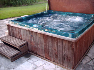 The inviting hot tub is the pefect way to relax after a long day of travel or sightseeing