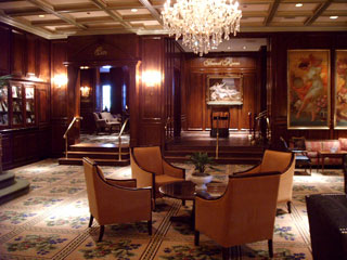 The stately lobby area near the entrance to the five-diamond rated French Room restaurant in the Adolphus in Dallas. To the left are displayed letters and photographs of some of the more famous who have stayed here