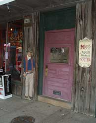 Front entrance to Miss Molly's, with John Wayne overlooking his star on the sidewalk